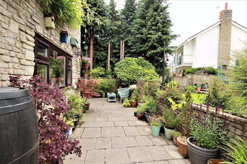 patio garden to the side of detached dwelling